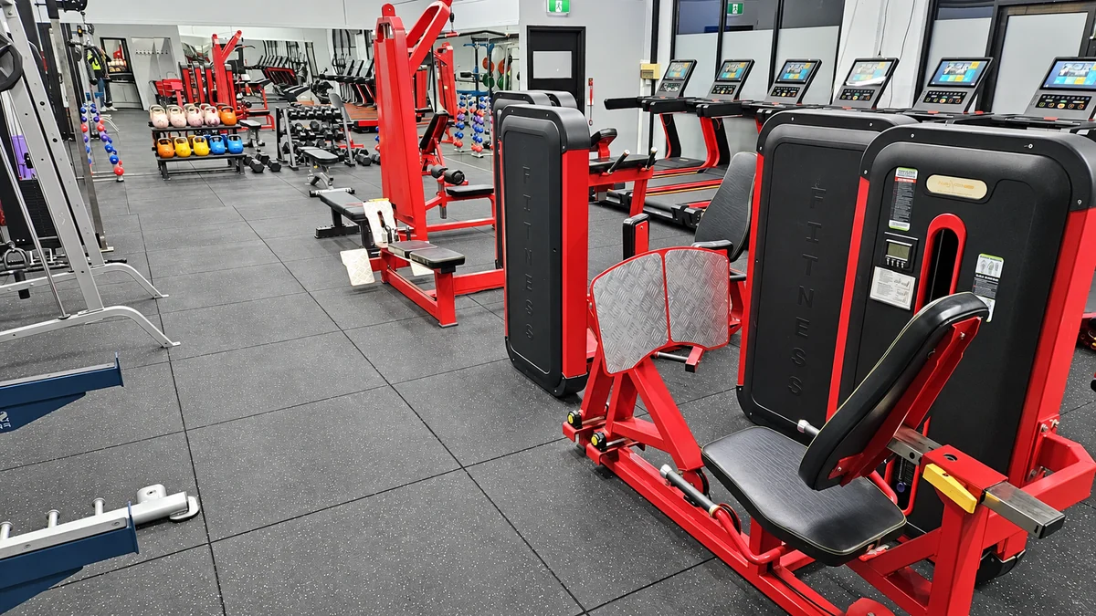 Red strength-training machines at Top Gym Women’s Werribee