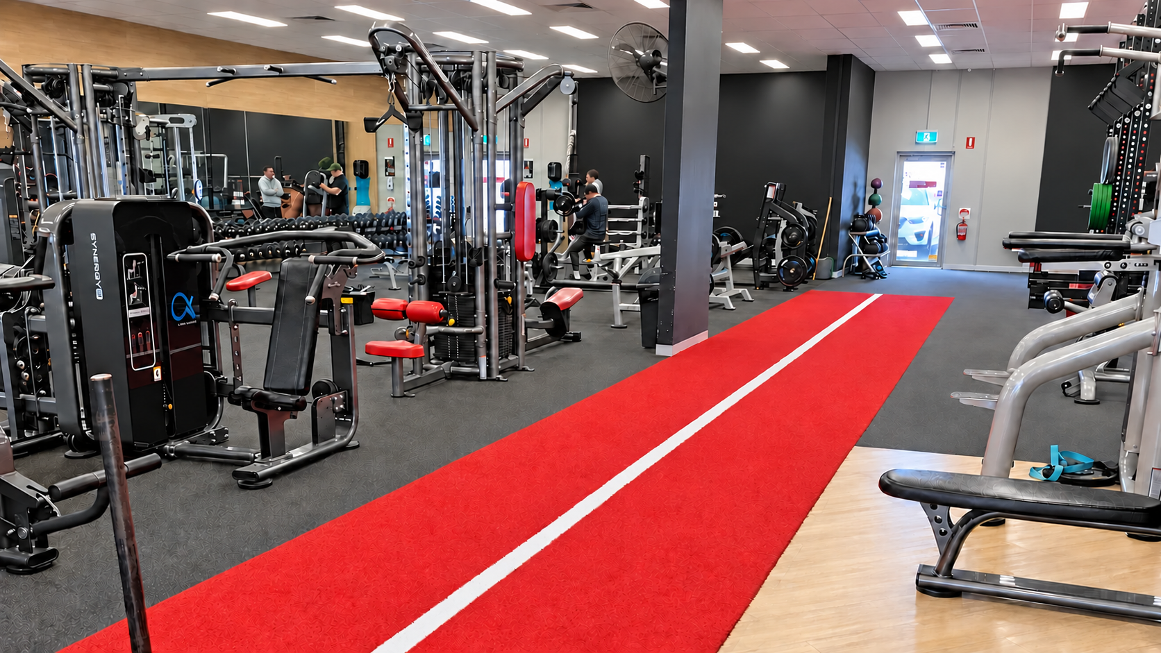 Weights, strength machines and the red training track at Top Gym Knoxfield